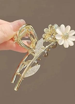 Заколка металева золотистого кольору з квіткою