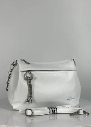 Жіноча біла сумка через плече з екошкіри італійського бренду gildatohetti.1 фото