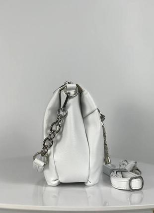 Жіноча біла сумка через плече з екошкіри італійського бренду gildatohetti.5 фото