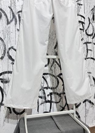 Женские спортивные штаны брюки брюки nike, оригинал, винтаж, на затяжках, кархарт, из карманы, повседневные, карго, удобные, легкие, белые8 фото