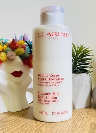 Оригінал зволожуючий бальзам clarins moisture-rich body оригинал крем лосьон для тела