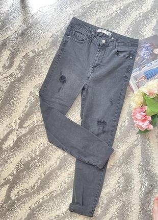 Джинсы рваные