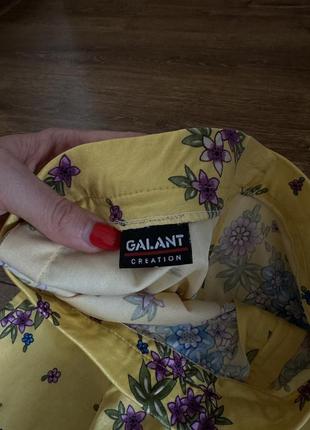 Стильная желтая юбка миди с цветами размер xs-s с разрезом6 фото