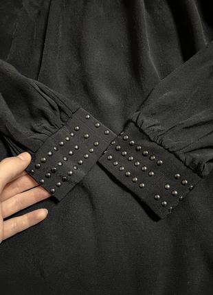 Черное платье свободного кроя с рукавами подойдет беременным8 фото