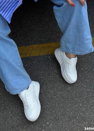 Кеди на високій підошві