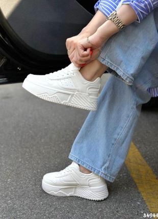 Кеди на високій підошві