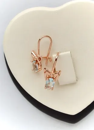 Серьги с голубыми цирконами (медицинское золото)