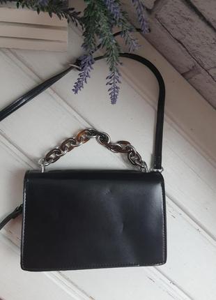 Маленька чорна сумка крос-боді