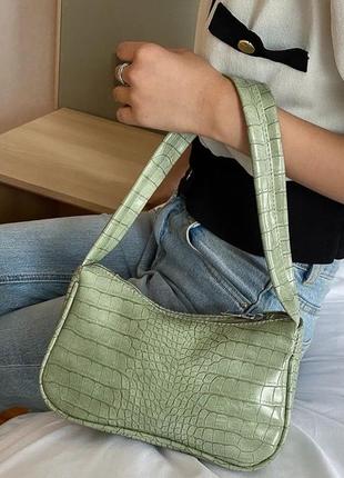 Зелена сумочка з тисненням
