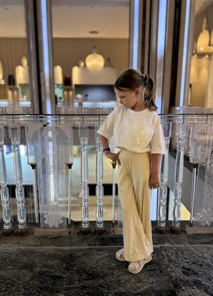 Бежевые брюки в школу в рубчик