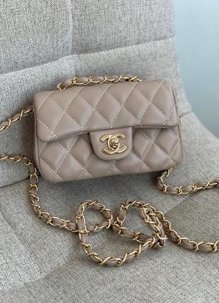 Женский элегантный кожаный клатч chanel брендовая сумка шанель бежевая с ручкой на цепочке3 фото