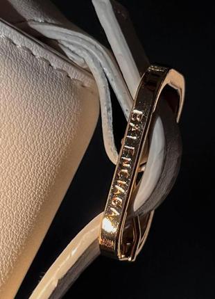 Стильна універсальна сумочка для жінок з ручкою balenciaga сумка баленсіага брендова бежева шкіряна9 фото