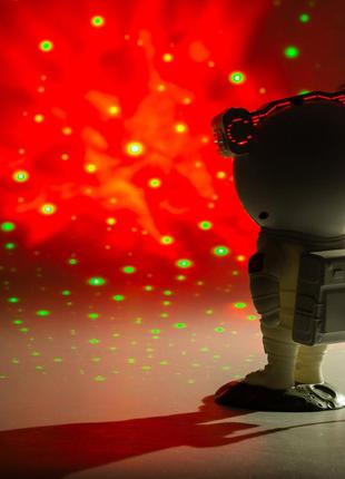 Світлодіодний проектор-нічник космонавт з пультом дистанційного керування 8 режимів 5 вт на акумуляторі4 фото