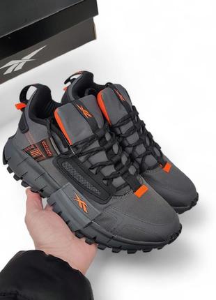 Чоловічі кросівки Чоловічі кросівки reebok 44 р edge сірі з помаранчевим водонепроникні відмінна якість рібок весняні осінні демісезонні кеди4 фото