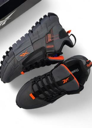Чоловічі кросівки Чоловічі кросівки reebok 44 р edge сірі з помаранчевим водонепроникні відмінна якість рібок весняні осінні демісезонні кеди7 фото