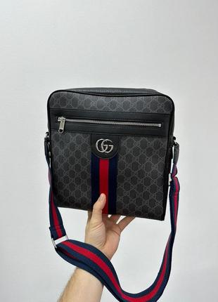Чоловіча шкіряна сумка люкс якості у брендовому стилі7 фото