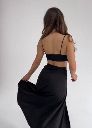 Молодіжна чорна модна шовкова спідниця на запах 42-465 фото