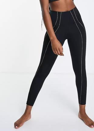 Женские лосины nike yoga dri-fit high-waisted 7/8 metallic trim leggigns
