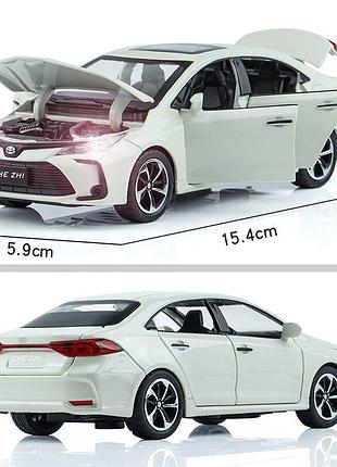 Модель автомобиля toyota corolla масштаб: 1:32. игрушечная машинка тойота королла белая (звук, свет). 7