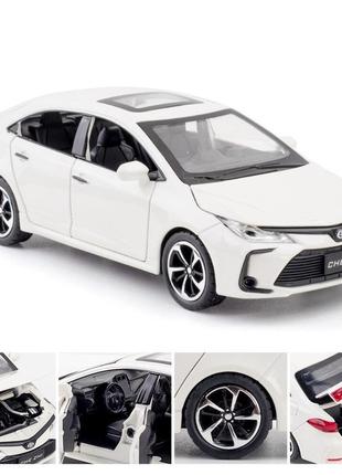 Модель автомобиля toyota corolla масштаб: 1:32. игрушечная машинка тойота королла белая (звук, свет). 2