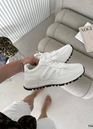 Жіночі легкі білі кросівки високої якості7 фото