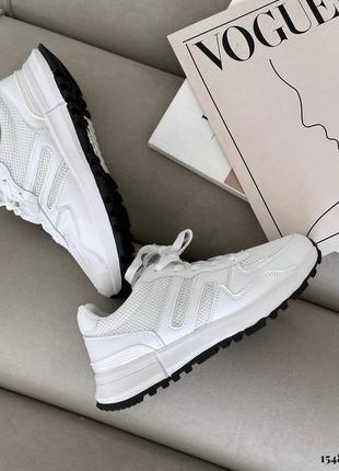 Жіночі легкі білі кросівки високої якості8 фото