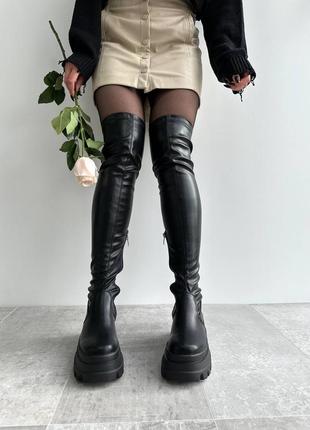 Нереально круті ботфорти на високій платформі