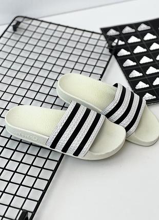 Шлепанцы ow constructed in a primeknit-material upper with Adidas BOOST technology midsole