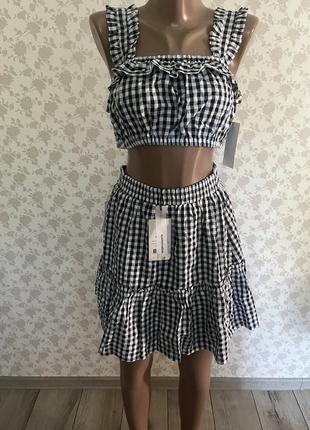 Костюм в клетку (топ и юбка) размера s от nakd