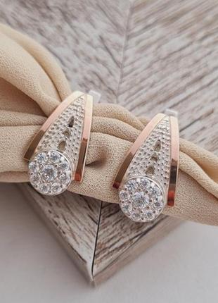 Серьги серебряные с золотыми напайками и белым цирконом массивные