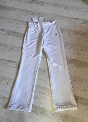Білі спортивні штани nike3 фото