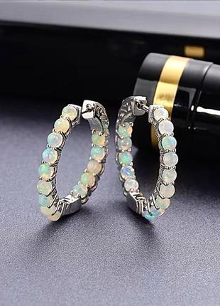 Шикарні срібні сережки кільця,конго 925 проби з натуральними ефіопськими опалами