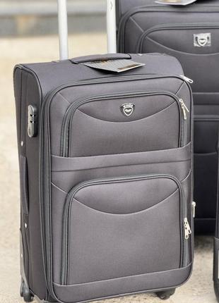 Мала валіза дорожня тканинна s польща на колесах wings з підшипником4 фото