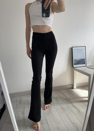 Чорні брюки лосіни високі штани кльош в рубчік спорт на танці heels