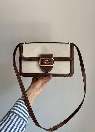 Сумка  coach  з текстилю та гладкої шкіри.