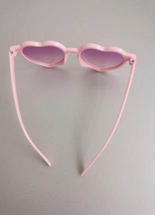 Дитячі сонцезахисні окуляри серце рожеві для дівчинки5 фото