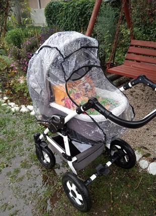 Современная универсальная коляска)4 фото