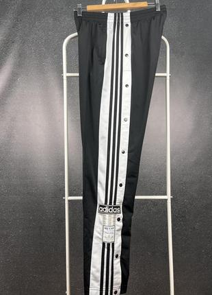 Оригінальні штани adidas original the brand with the three stripes adibrake на закльопках