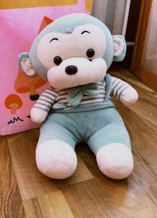 Детская игрушка обезьяна