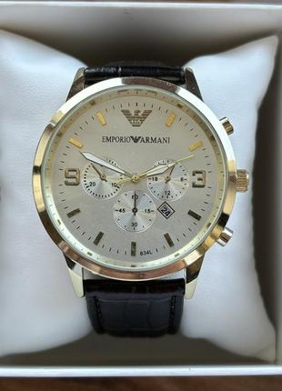 Чоловічий годинник на ремені emporio armani золотого кольору