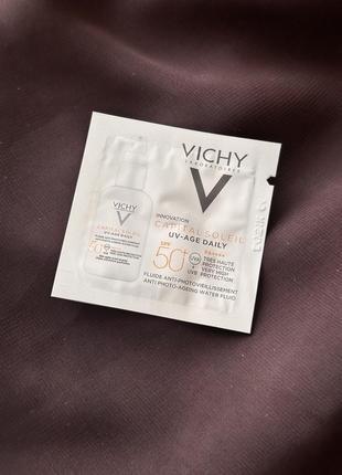 Сонцезахисний невагомий флюїд проти ознак фотостаріння шкіри обличчя, spf 50+ vichy capital soleil uv-age daily