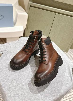 Ботинки коричневі чорні