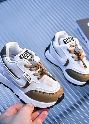 Кросівки для діток в описі дві ціни