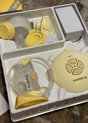 Электрический молокоотсос medela swing flex