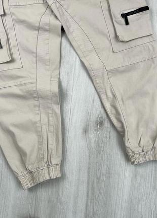 Карго брюки бежевые светлые трендовая вещь на весну и лето тянутся новые с бирками3 фото