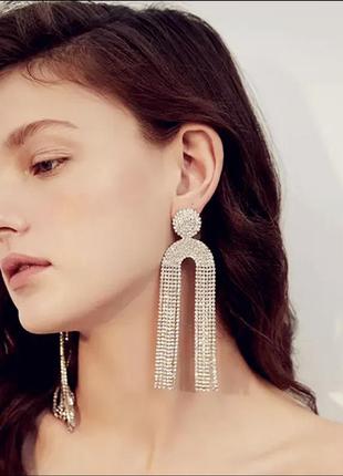 Вечірні сережки великі довгі золотисті з камінчиками зі стразами весільні