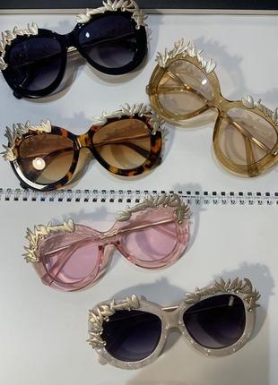 Жіночі сонцезахисні окуляри