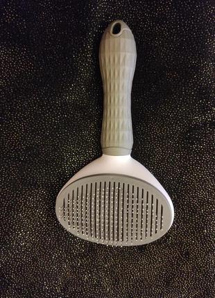 Щітка для вичісування шерсті