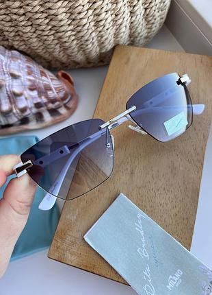 Фирменные солнцезащитные безоправные очки rita bradley rb3182 узкие