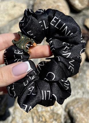 Гумка для волосся селін у чорному кольорі